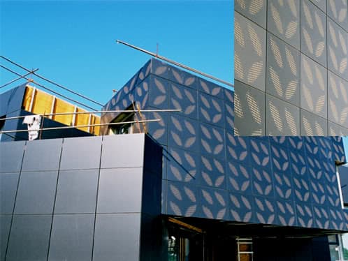 montaje fachada con paneles composite fresados