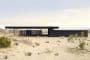 Experimento en el desierto: casa pintada de negro