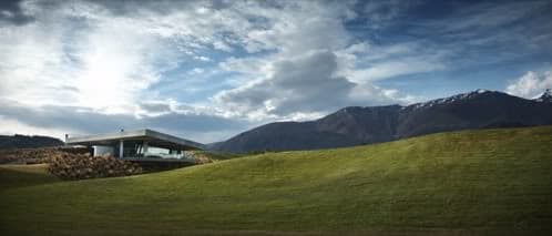 clubhouse-azotea-verde en un paisaje de montañas