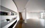 Apartamento ático en Madrid con superficies curvas