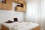 Geometric-Residence-apartamento-Liubliana-dormitorio