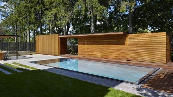 pabellón para piscina con aseo y ducha Amantea Architects